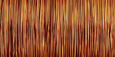 Close-up photograph of a spool of copper wire.