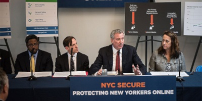 Photograph of speakers at the announcement of the 